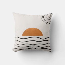 Almohada con olas del océano y puesta de sol dorad