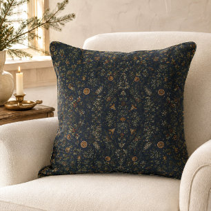Almohada con patrón botánico de Yule iluminado por