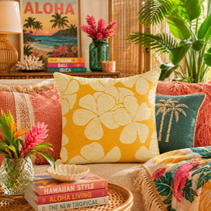 Almohada con patrón de flores de plumeria amarilla