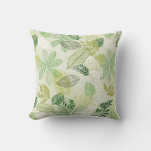 Almohada con patrón de hojas tropicales verdes acu