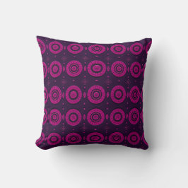 Almohada con patrón geométrico de círculos magenta