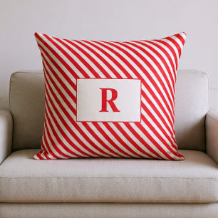 Almohada con rayas rojas y blancas monogramada