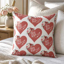 Almohada corazón de abrazos y besos