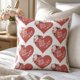 Almohada corazón de abrazos y besos