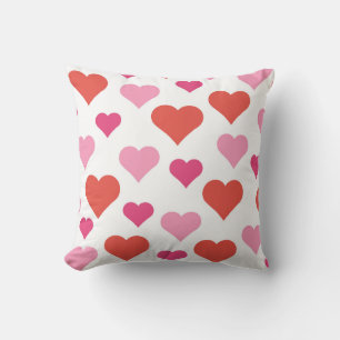almohada cuadrada del corazón rojo y rosa