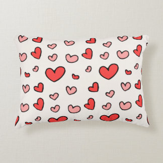 Almohada de acento con patrón de corazones rojos y