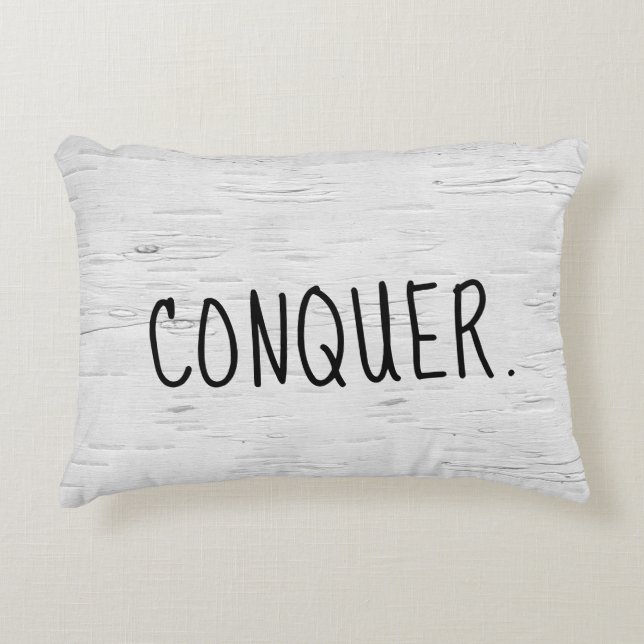 Almohada de acento con texto CONQUISTAR en árbol d (Anverso)