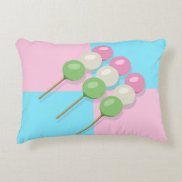 Almohada de acento dango rosa pastel con azul cont