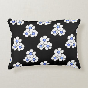 Almohada de acento de margarita centrada en azul