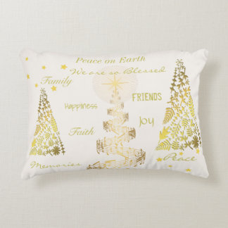 Almohada de acento dorado y crema de Navidad