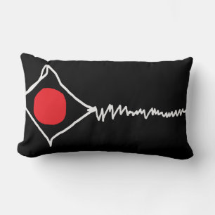 Almohada de acento negro con "cometa rota"