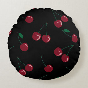 Almohada de acento redondeo negro de cerezas rojas