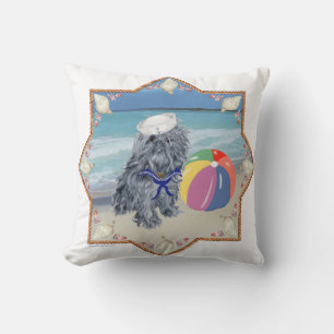 Almohada de Bruselas Griffon en la Playa