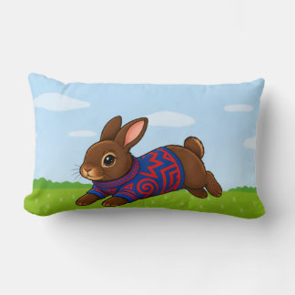 Almohada de Bunny saltando en un suéter estampado