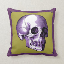 Almohada de calavera dorada y púrpura vista latera