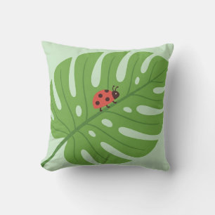 Almohada de cojín de mariquita linda en hoja de Mo