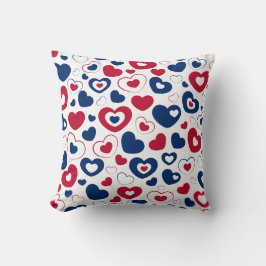 Almohada de corazones rojos y azules