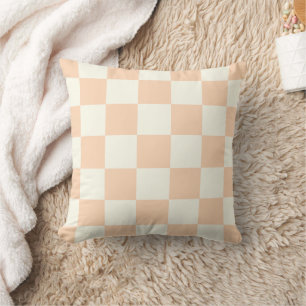Almohada de cuadros melocotón y blanco