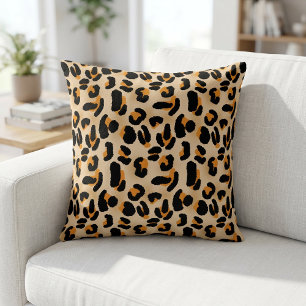 Almohada de estampado leopardo naranja y negro