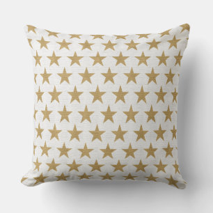 almohada de estrellas doradas