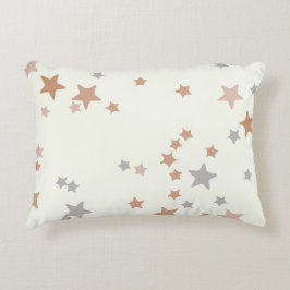 almohada de estrellas en rosa neutro y gris