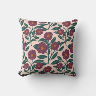 Almohada de flores de mermelada roja con hojas ver