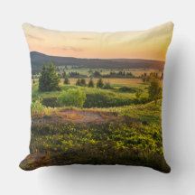 almohada de fotos de las montañas del atardecer
