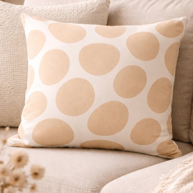 Almohada de geometría de arena suave (Soft sand tones and rounded geometry bring grounded balance to modern neutral spaces)