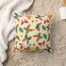 Almohada de jardín de mariposas coloridas