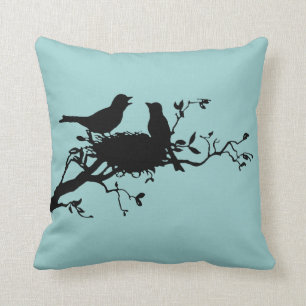 Almohada de la silueta de los pájaros de la