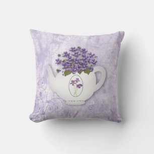 Almohada de la tetera de las violetas