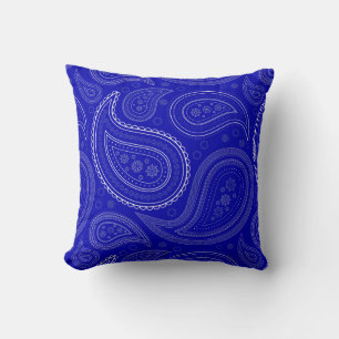 Almohada de lanzamiento de Paisley blanca sobre az