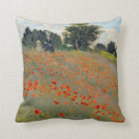 Almohada de las amapolas de Monet<br><div class="desc">Detalle de las AMAPOLAS A de MONET de Les Coquelicots de Claude Monet un Agenteui. Una impresión de una ladera de amapolas en el sur de Francia.</div>