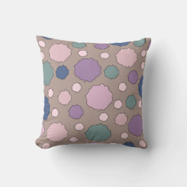 Almohada de lunares en tonos pastel atenuados y ne