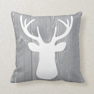 Almohada de madera gris de los ciervos