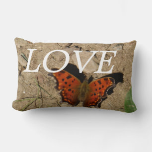 Almohada de mariposa naranja y verde lOVE