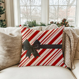 Almohada de Navidad con lazo a rayas de caramelo