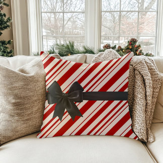 Almohada de Navidad con lazo a rayas de caramelo