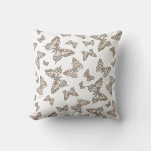 almohada de patrón gráfico de mariposas