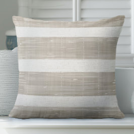 Almohada de rayas neutras y blancas