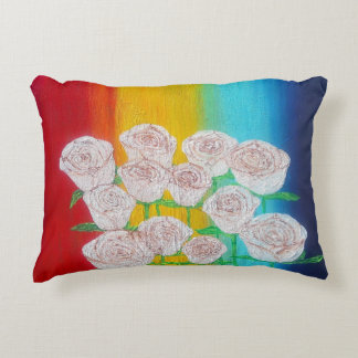 almohada de rosas de fondo multicolor