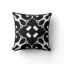 almohada de tejas negras y blancas en español
