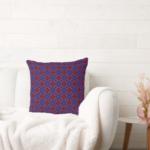 Almohada de tirar roja con estrellas azules