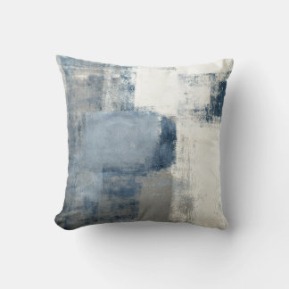 Almohada de tonos azules/grises/blancos abstractos