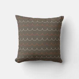 Almohada de vieira en tono rosado, oliva y óxido