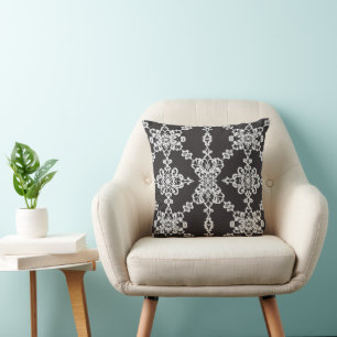 Almohada decorativa con patrón de encaje