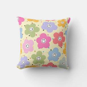 Almohada decorativa con patrón de flores sonriente