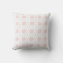 almohada decorativa con un patrón geométrico