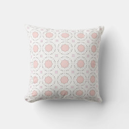 almohada decorativa con un patrón geométrico