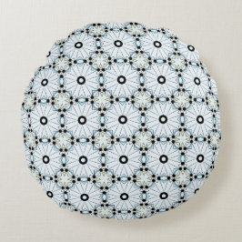 almohada decorativa con un patrón geométrico